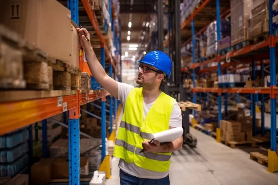 Professional warehouse worker protective work wear holding checklist checking inventory storage room 342744 1563 1 qec76z4voegt9umrw01bbti564wr42g6q8rzp965ww